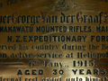 Detailed view of brass plaque with inscribed text about the service of Trooper George Van der Graaf Burlinson