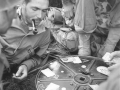 American servicemen playing cards